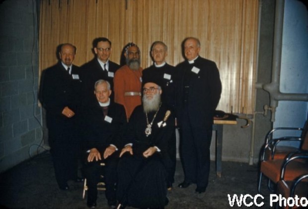 The six new elected Presidents of the World Council of Churches (1954). Standing, left to right, the are Bishop Dibelius of the Evangelical Church of Germany, Bishop Barbieri of the Methodist Church in Argentina, Metropolitan Juhanon of the Mar Thoma Syrian Church of Malabar, India, the Very Rev. John Baillie of the Church of Scotland, Bishop Sherril of the Protestant Episcopal Church of the U.S.A. Seated, left to right, Bishop bell of the Church of England (Honorary President), Archbishop Michael of the Eastern Orthodox Church in North and South America.