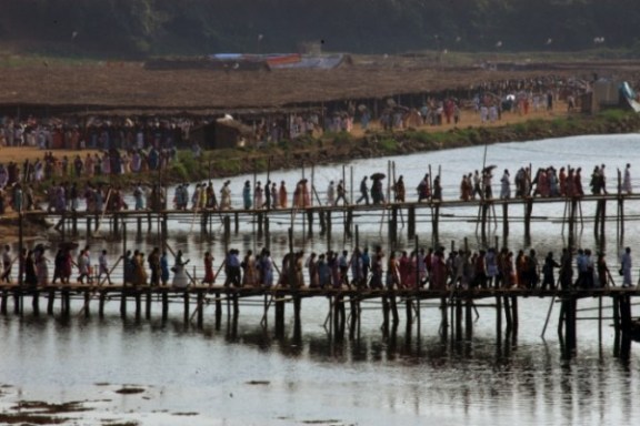 Temporary bridges built for people to cross the shallow waters of the River Pamba.
