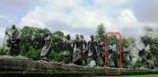 "Gyarah Murti” or "Eleven Statues with the priest highlighted in Red.