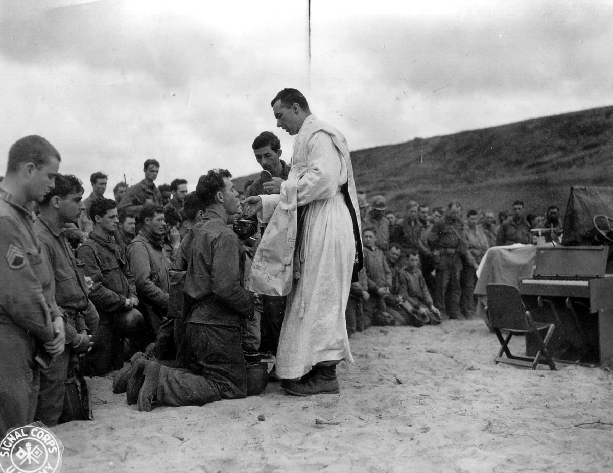 Father John McGovern gives mass in France during World War II. (U.S. Army Signal Corps)
