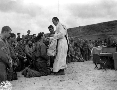 Father John McGovern gives mass in France during World War II. (U.S. Army Signal Corps)